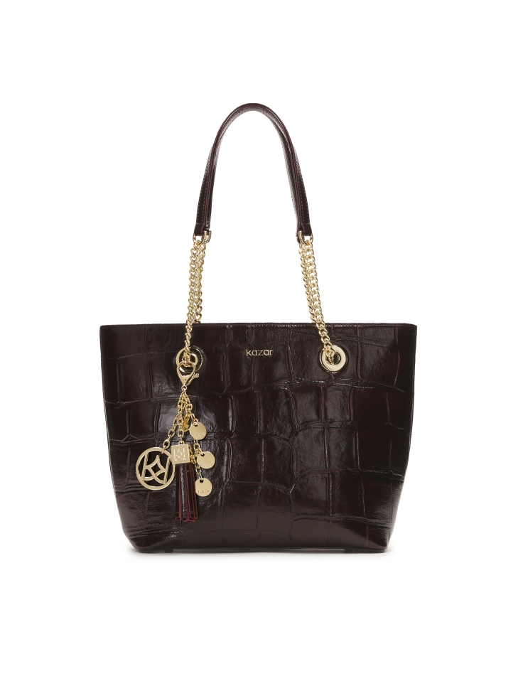 Elegant burgundy handbag with embossed pattern