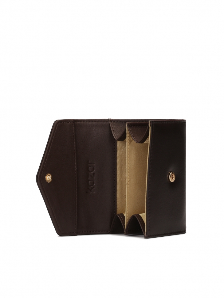 Small purse with large KAZAR monogram.