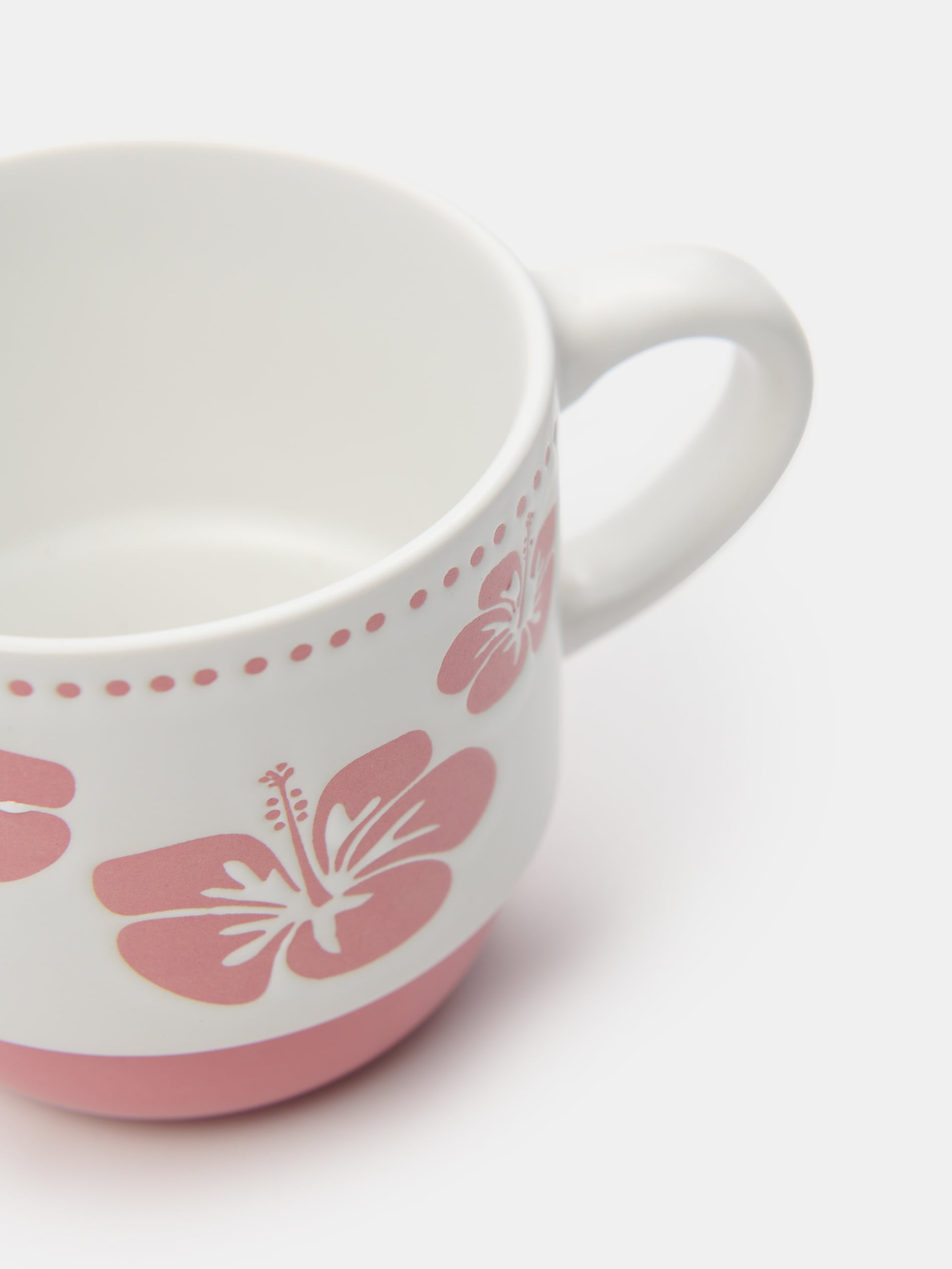 Ceramiczny kubek z motywem kwiatowym