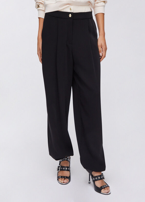 Pantaloni con doppio cintone