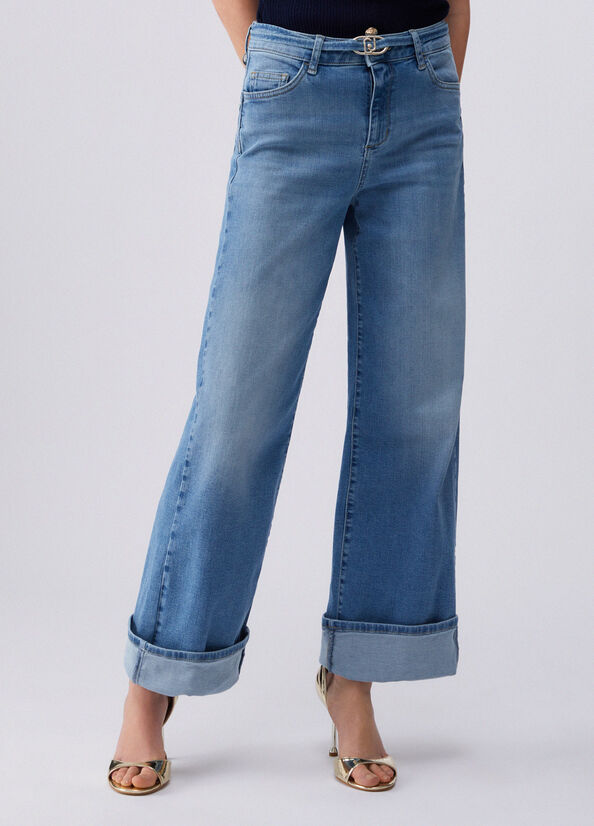 Jeans flare con risvolto
