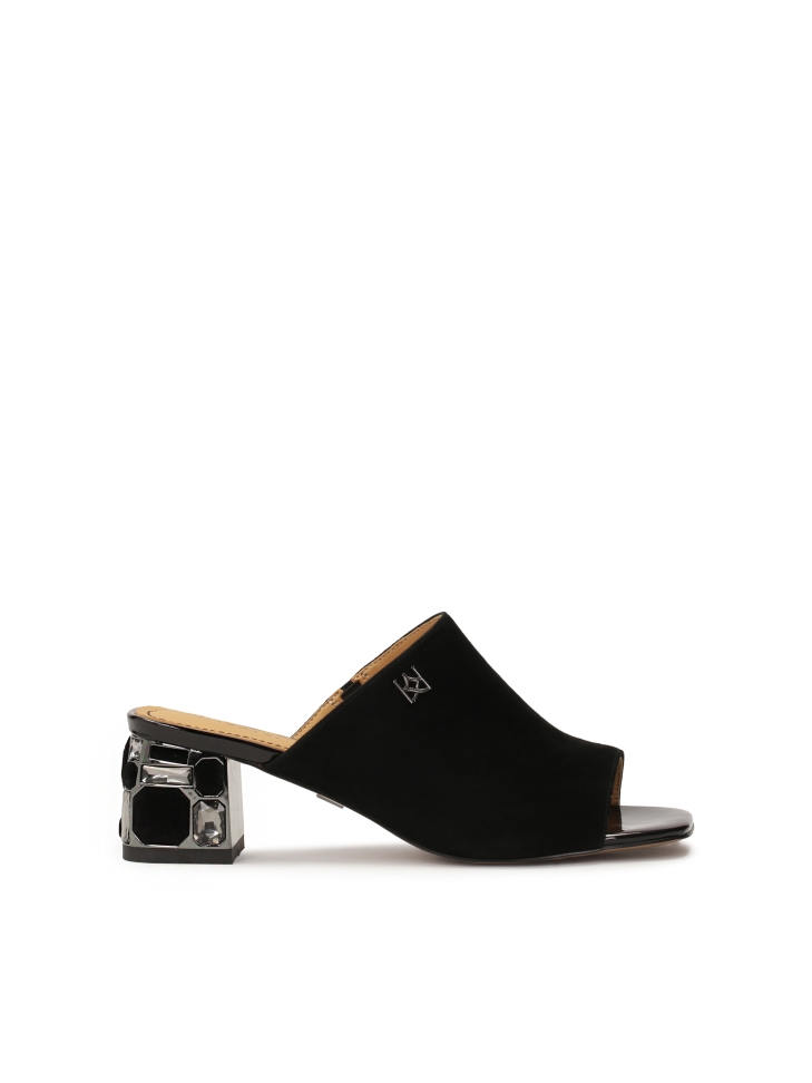 Black mules with rhinestones on the heel