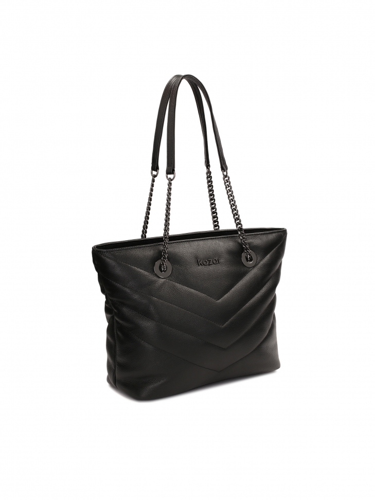 Capacious shoulder bag with gun metal hardware