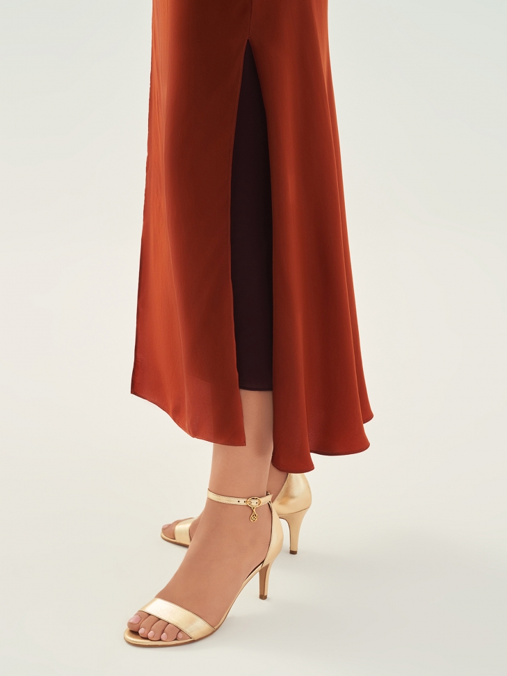 Leather golden sandals on a comfortable heel