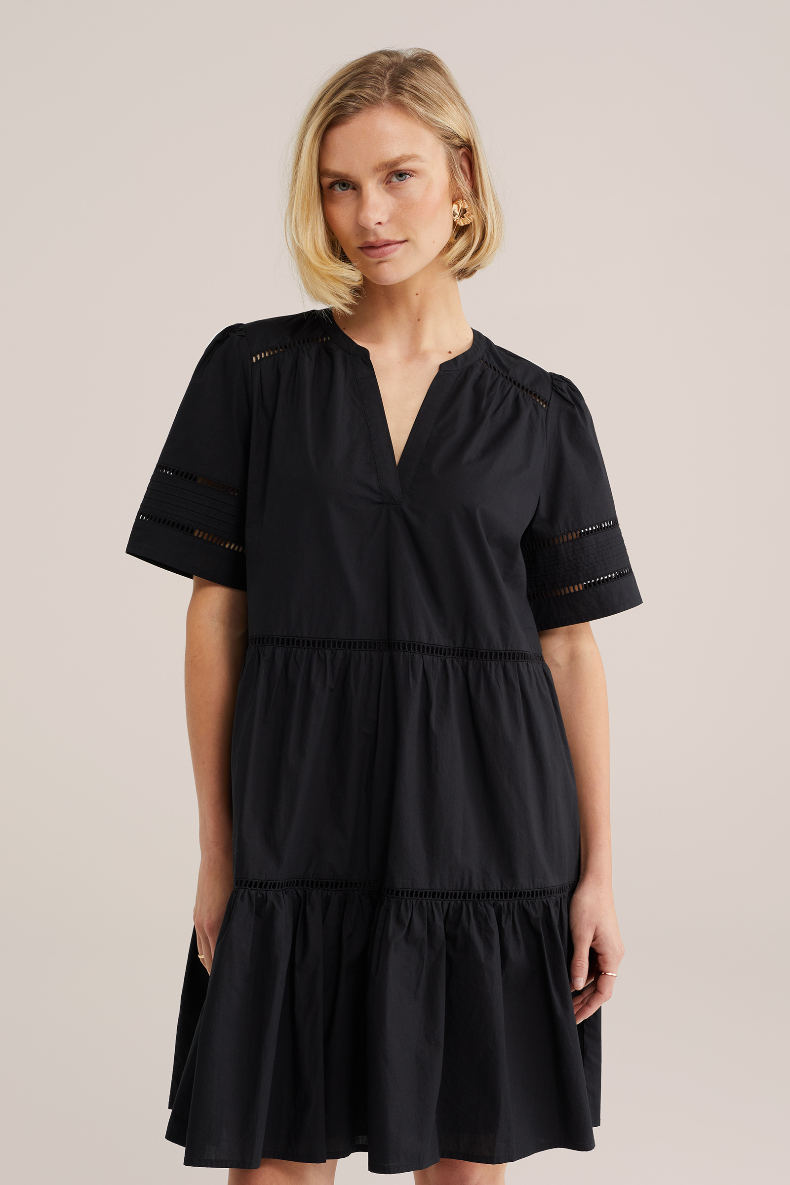 Dames jurk met opengewerkt structuur