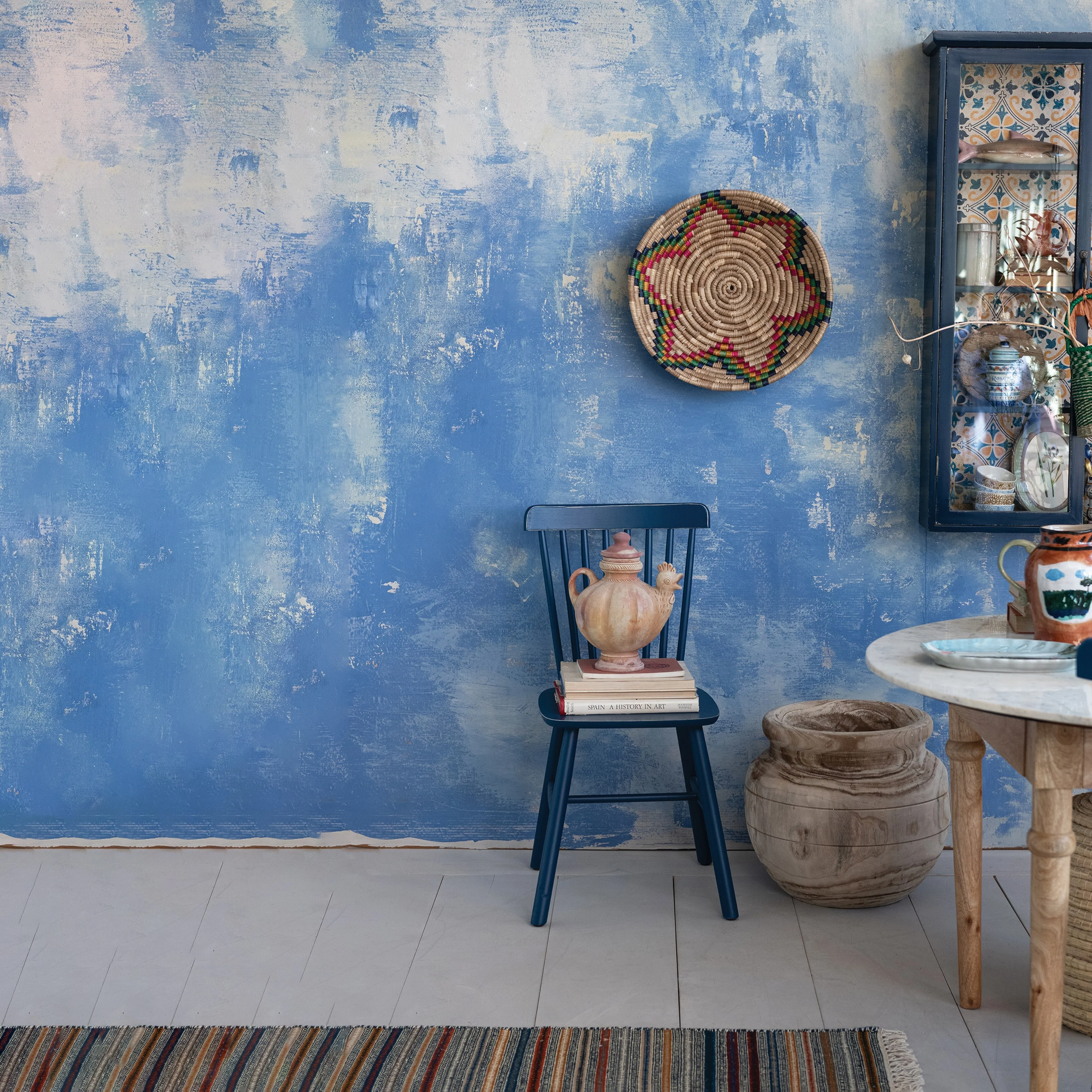 Wood and Glass Cabinet with 4 Shelves and Patterned Paper Back, Distressed Blue and Multicolor - 31.9L x 8.6W x 48.0H