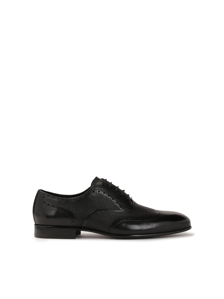 Elegant black oxfords with rosette decoration