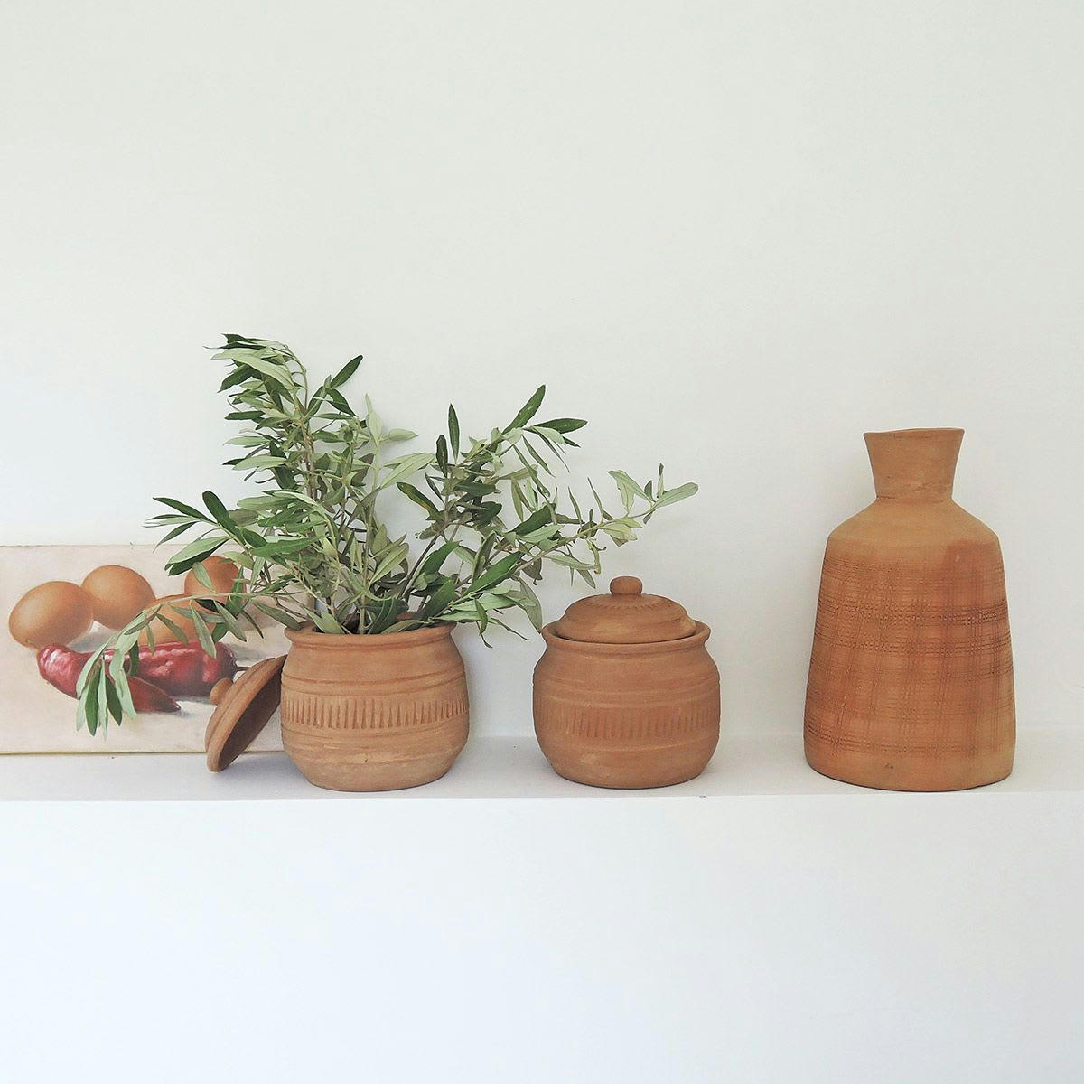 - Vase gravé terre cuite