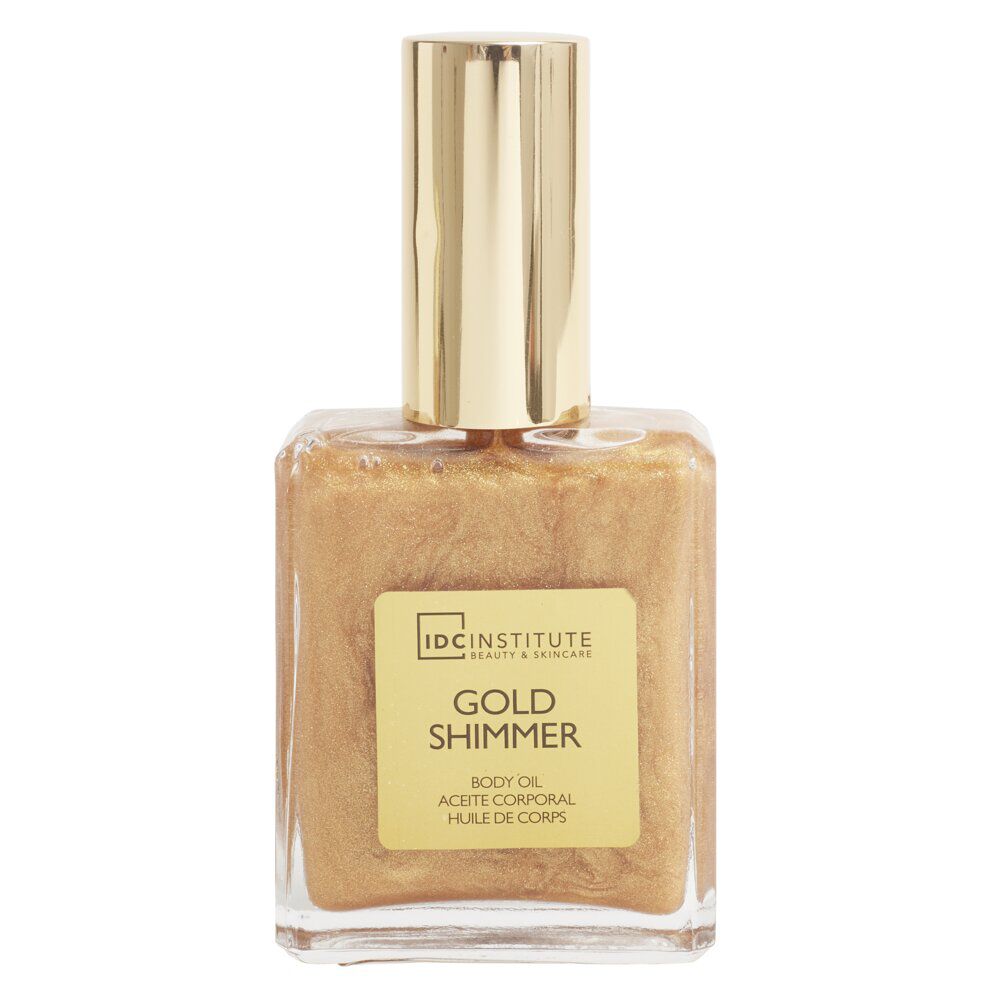 Huile pour le corps 50ml pailletée dorée dans bouteille en verre