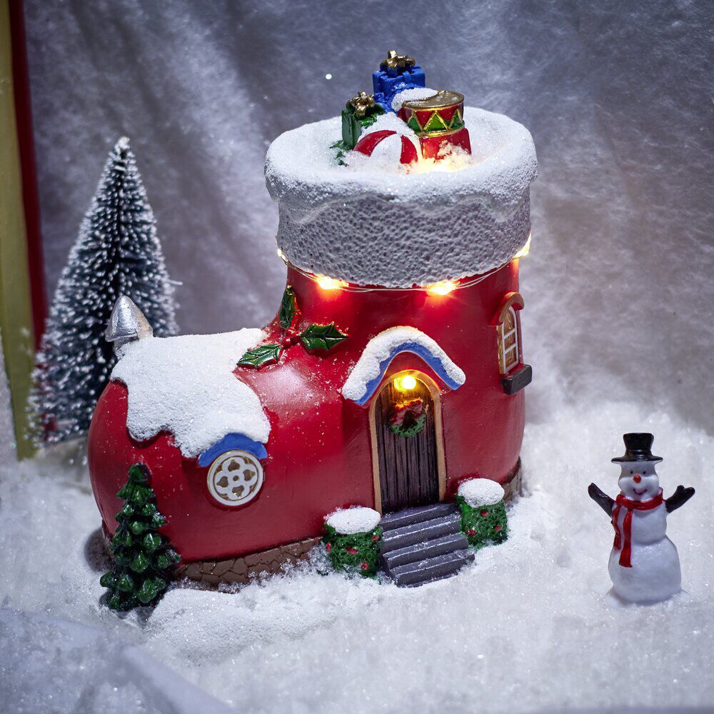 Maison de No&euml;l lumineuse forme botte rouge et blanche polyrésine 13x9xH13cm