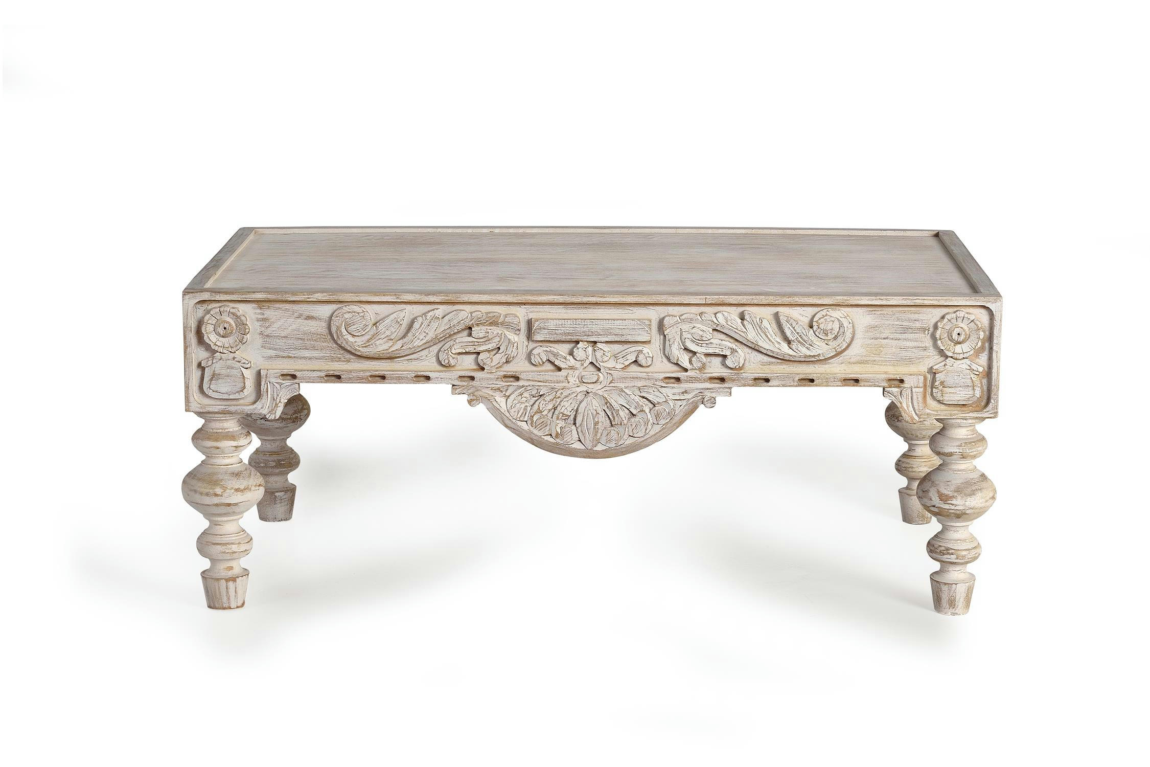 - Table basse en bois de manguier sculptée
