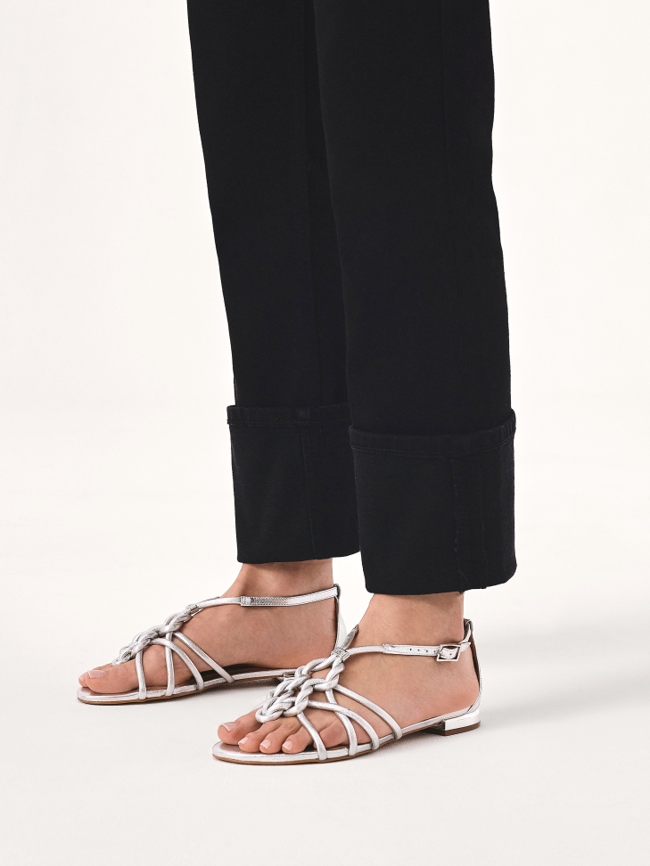 Silver flat sandals with interlaced straps