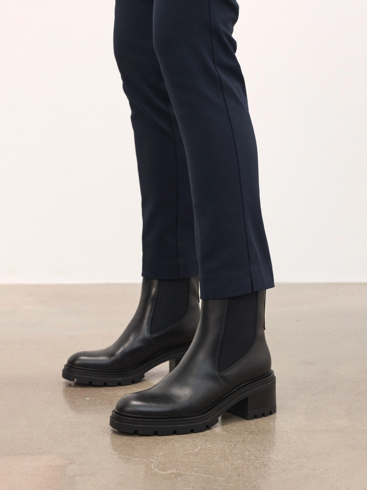 Black Chelsea boots with wide heels