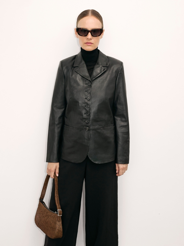 Leather handbag with natural bristles in animal pattern