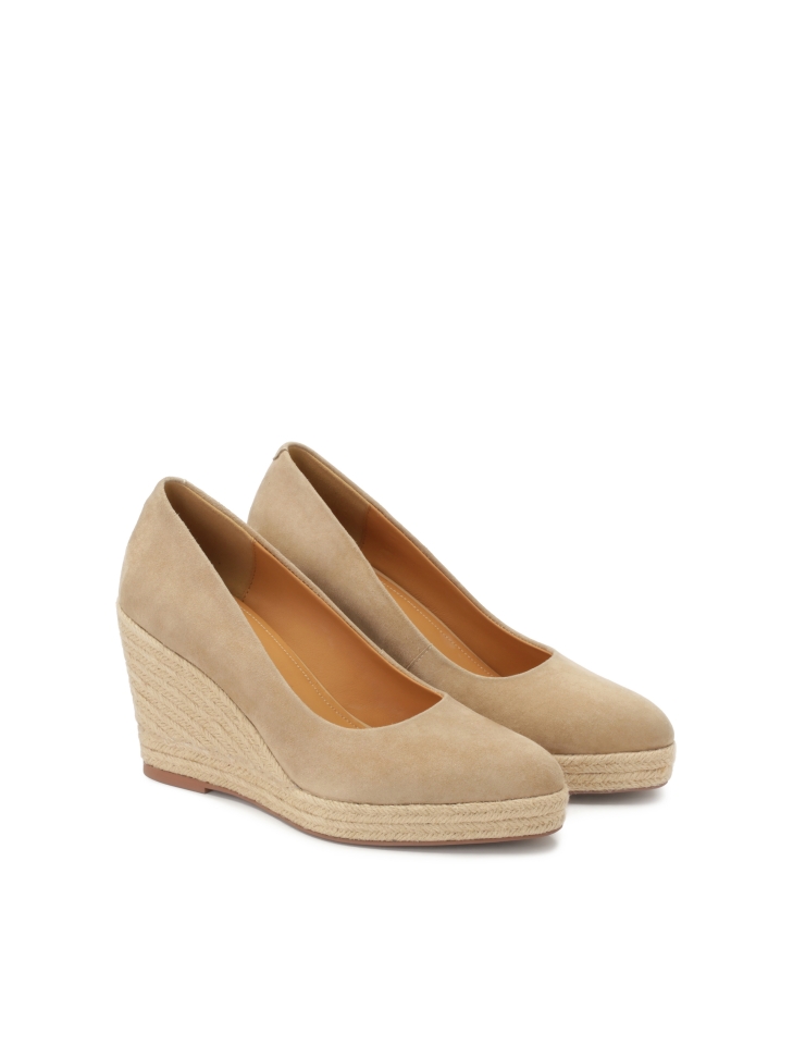 Beige suede pumps on a platform heel