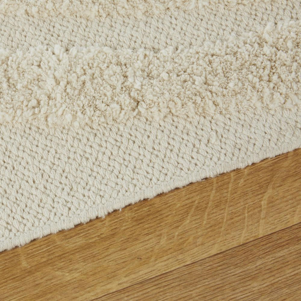 LOTARO - Tapis en coton bio tissé écru motifs graphiques tuftés 140x200