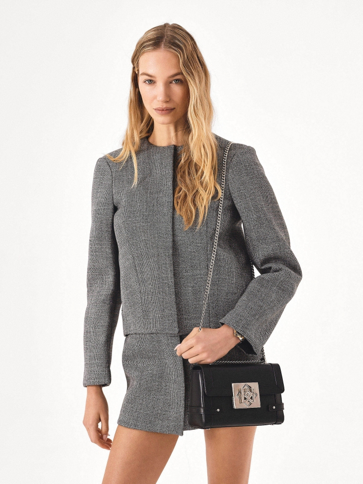 Black leather chain handbag with rigid construction