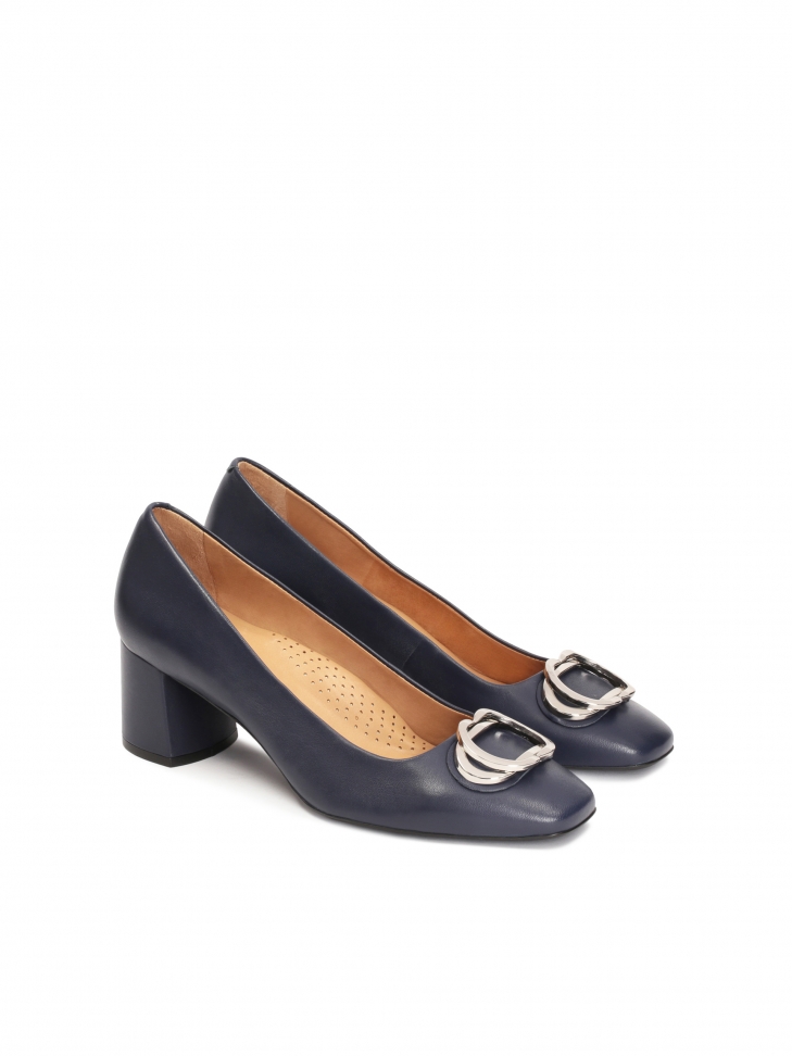 Navy blue leather pumps with metal embellishments
