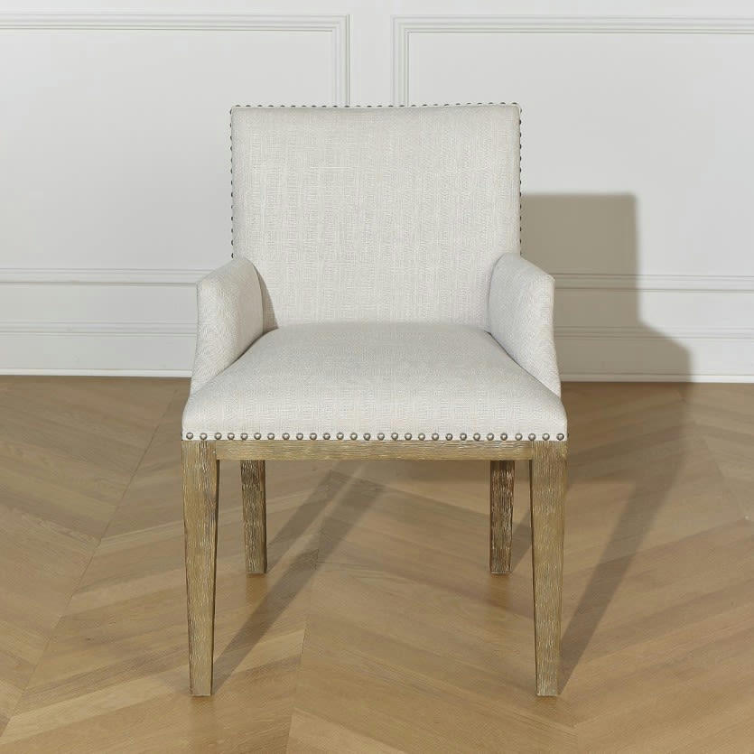 KENZA - Fauteuil de table clouté en tissu beige