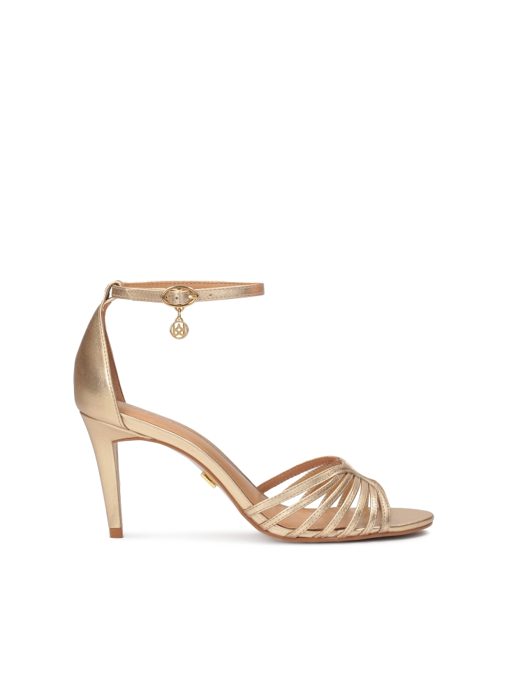 Gold sandals with full heel