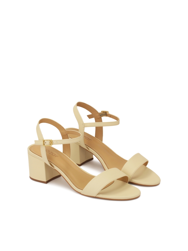 Classic cream sandals on a low post