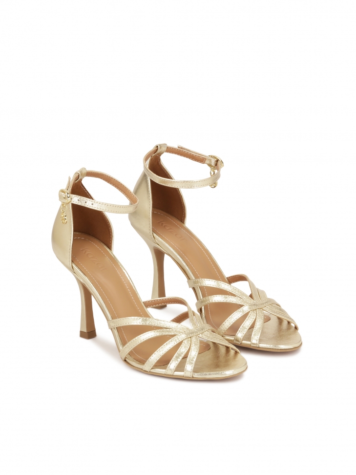 Gold sandals with built-in heels
