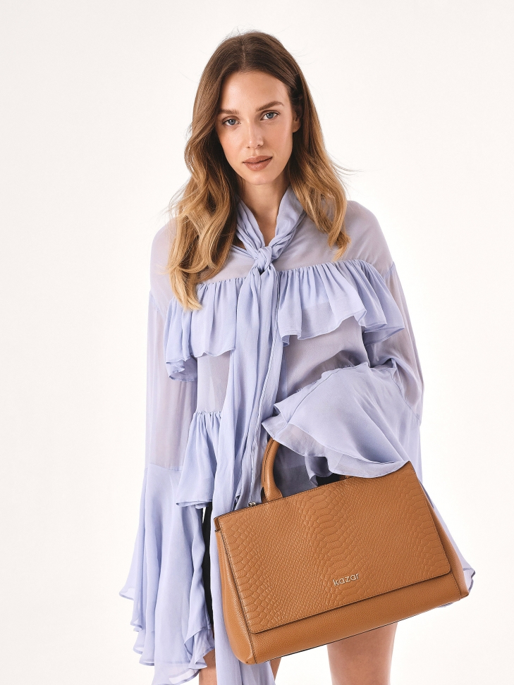 Light brown trunk with embossed flap