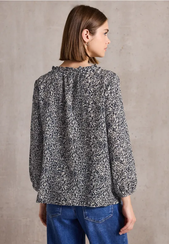 Gemusterte Bluse mit Rüschen