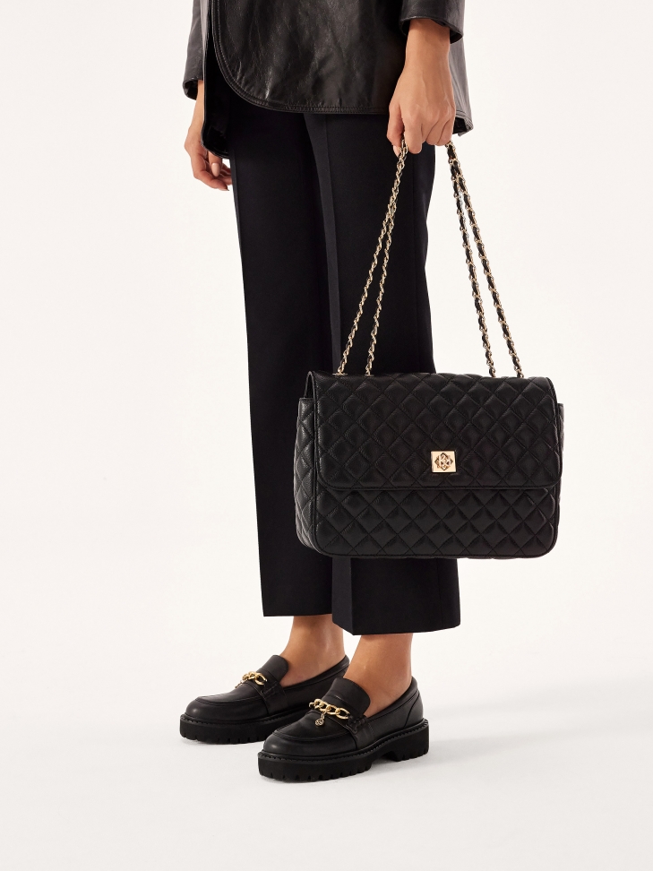 Black leather shoulder bag with quilted pattern