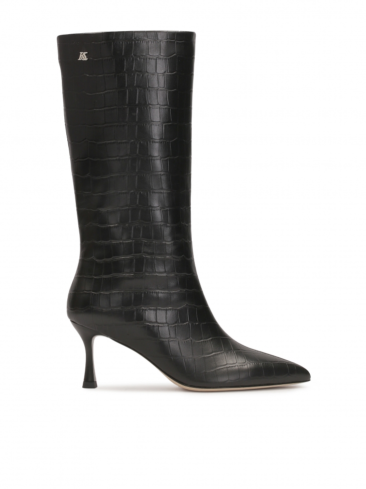 Black high top boots with embossed leather upper
