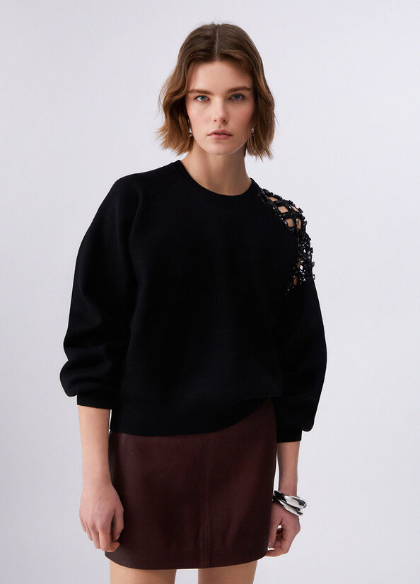 Maglia con ricamo gioiello