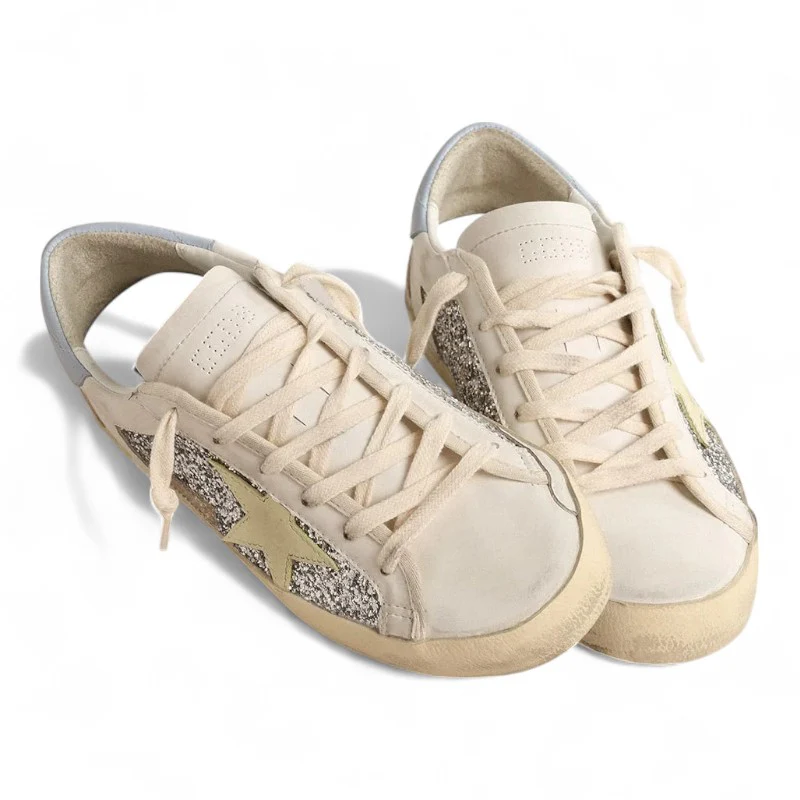 Bio-based Super-Star sneakers with silver glitter and a yellow leather star