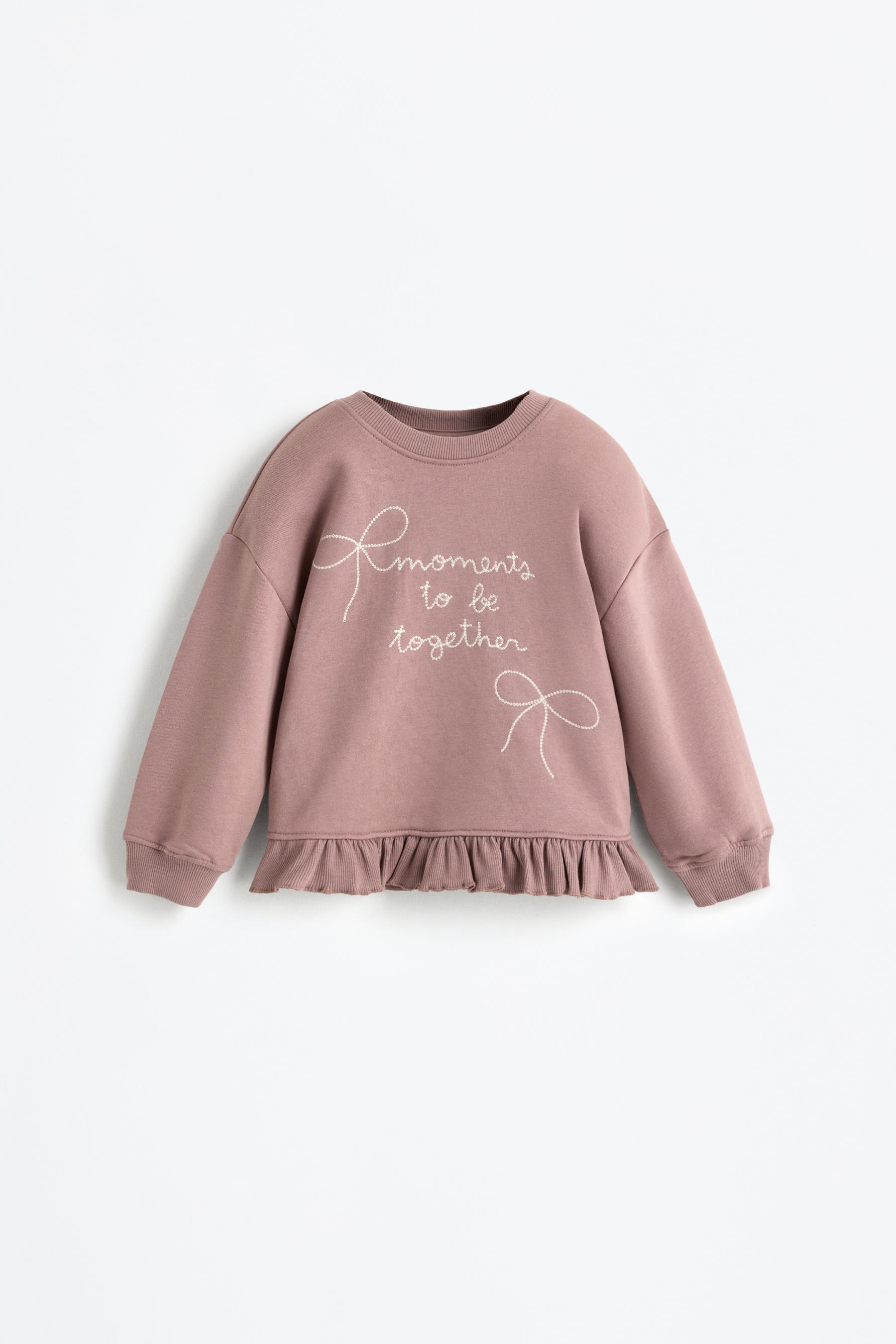 Conjunto sudadera volante y pantalón