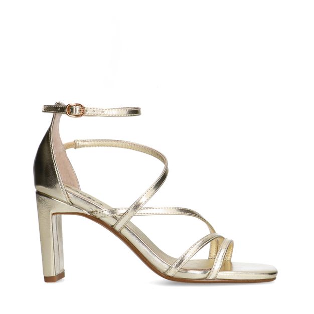 Gouden sandalen met hak