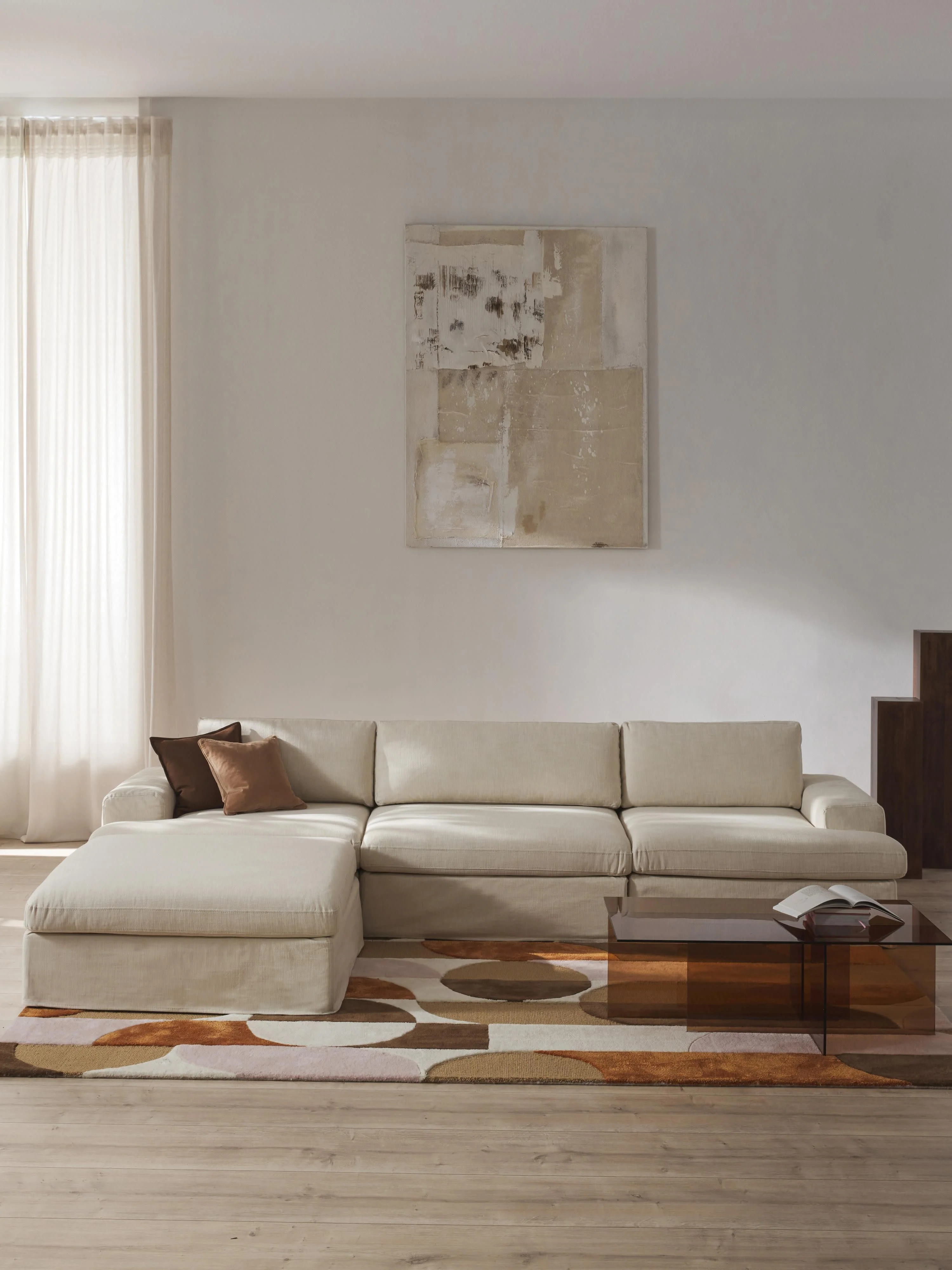 Modulares Sofa Russell (4-Sitzer) mit Hocker (links/rechts)