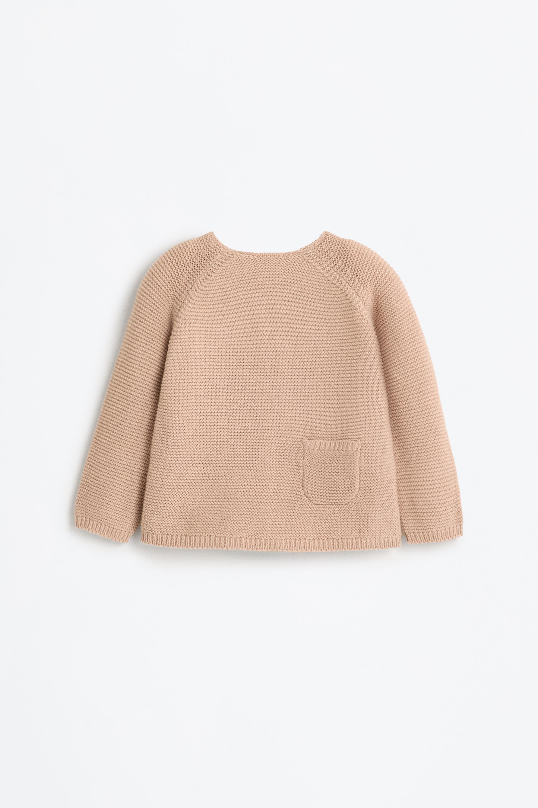 Conjunto de jersey, polaina y gorrito