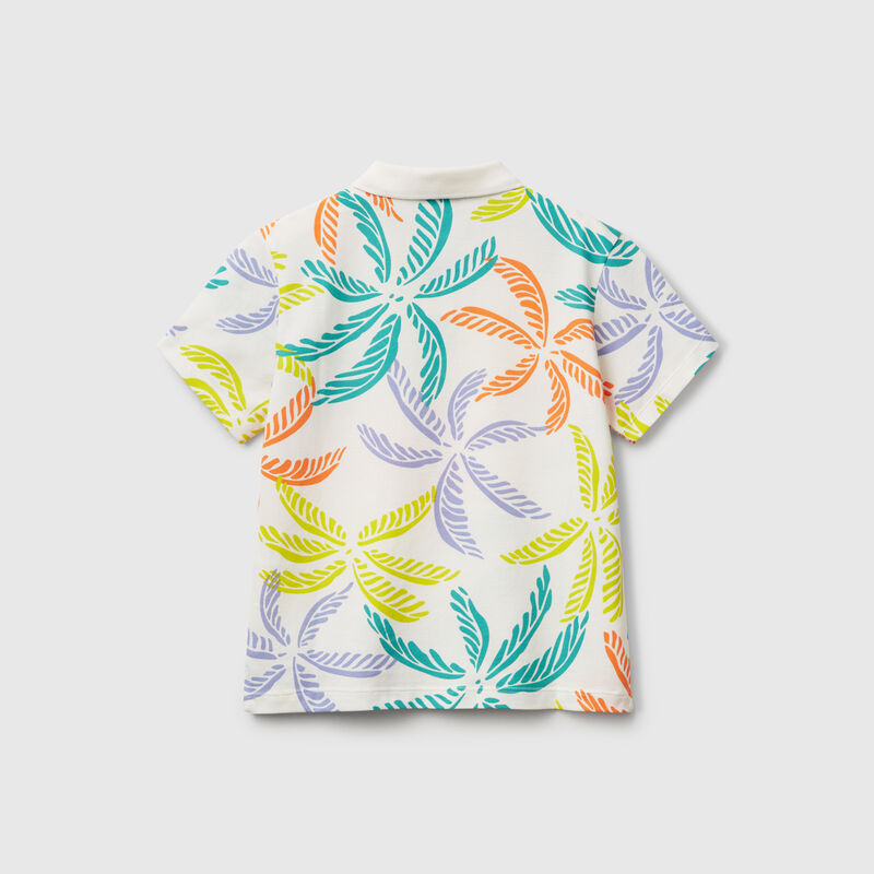 White polo with tropical print