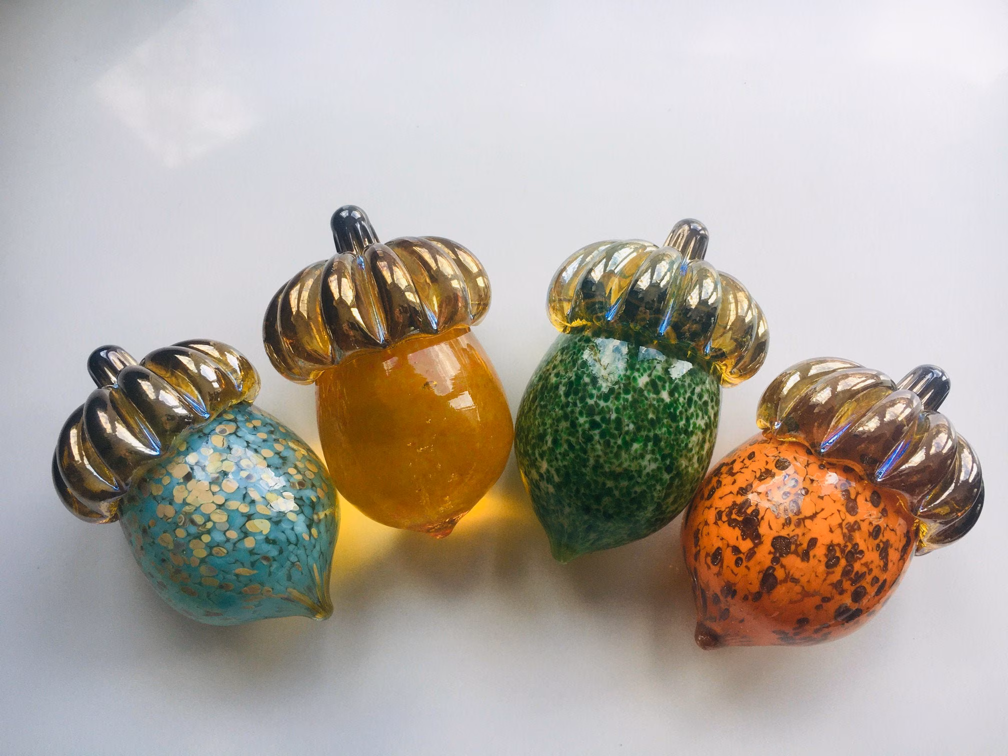 Hand blown glass acorn paperweights