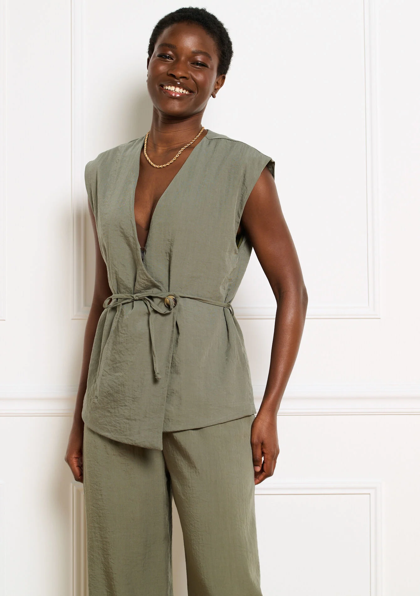 Wikkelblouse met strikceintuur