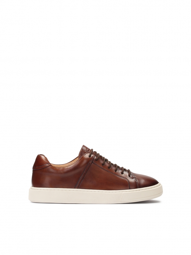Men's brown sneakers on a white sole