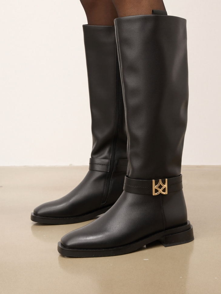 Black boots with logo accent