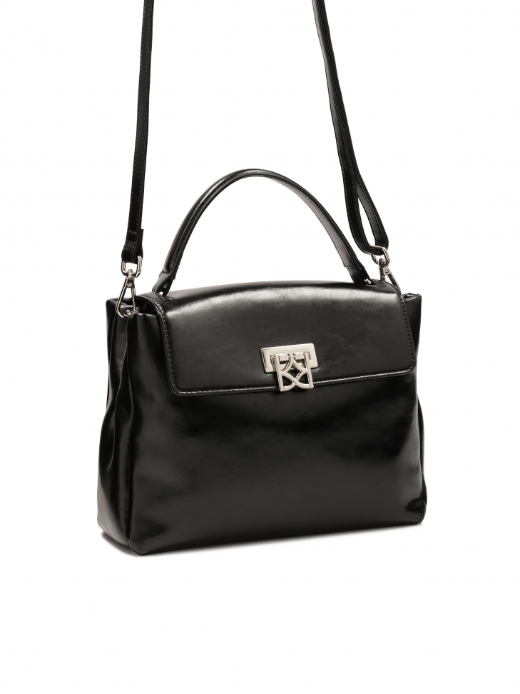 Leather handbag with decorative clasp