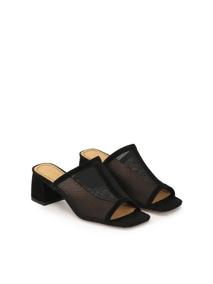 Black mesh mules on a low post