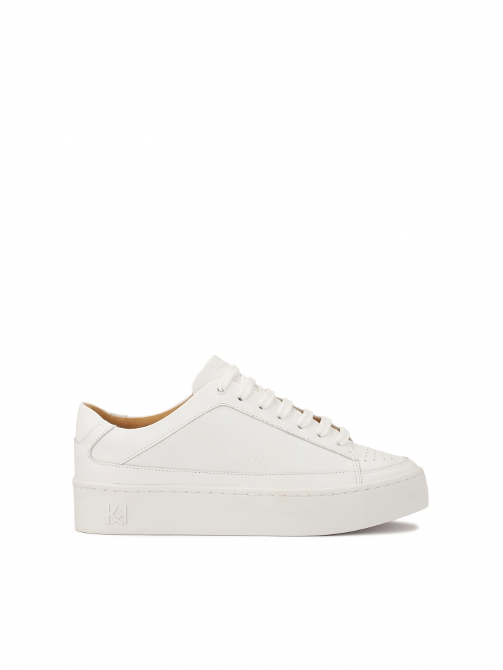White sneakers with perforation on the nose
