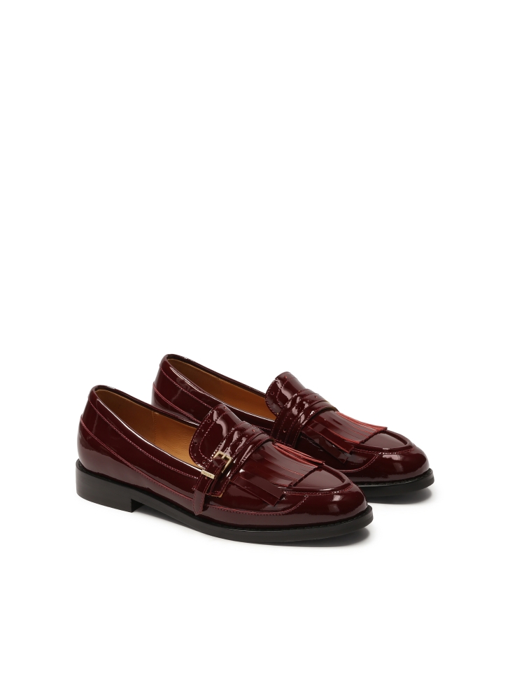 Maroon patent leather shoes with tassels