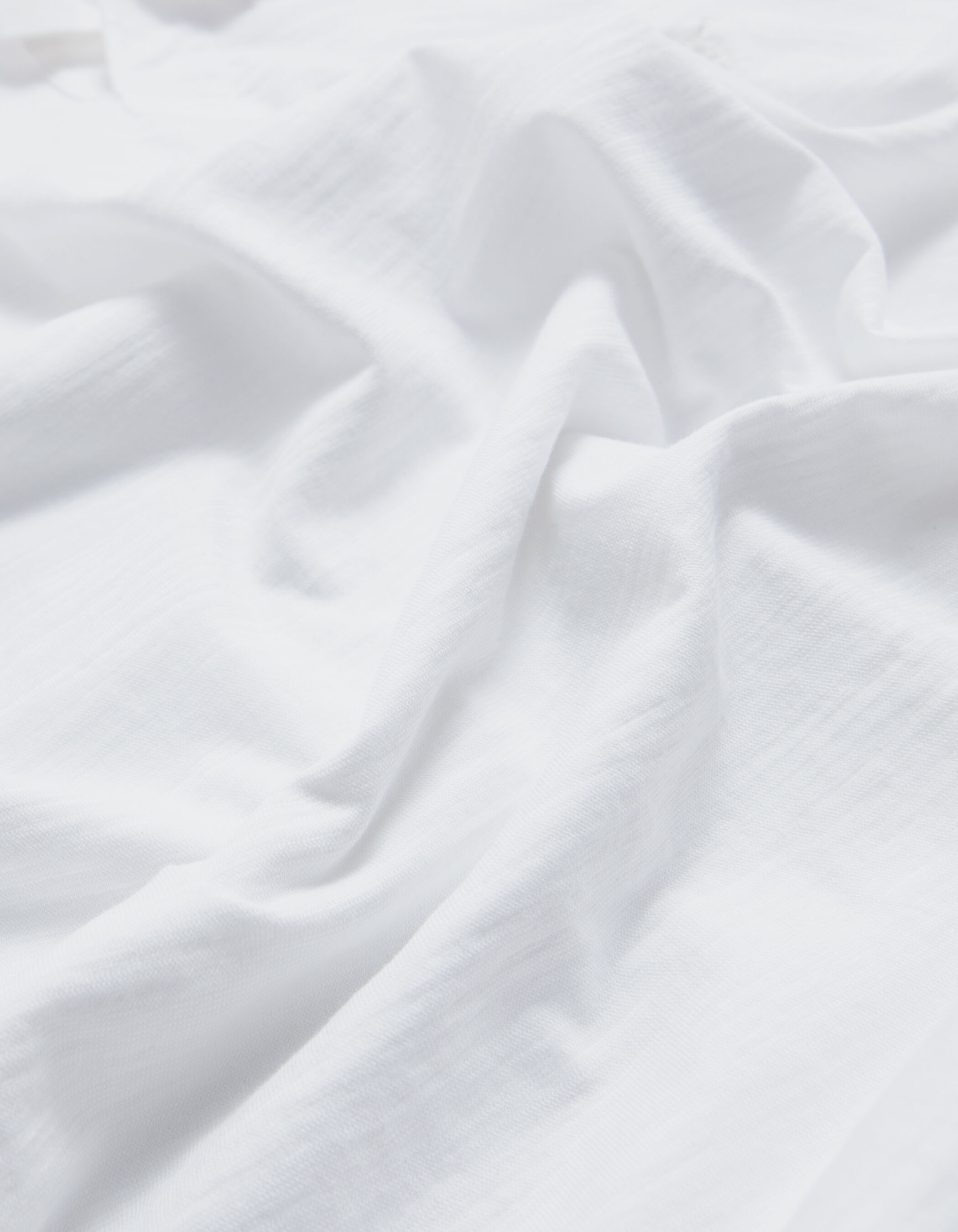 Polo blanc L'Essentiel coton bio flammé Homme