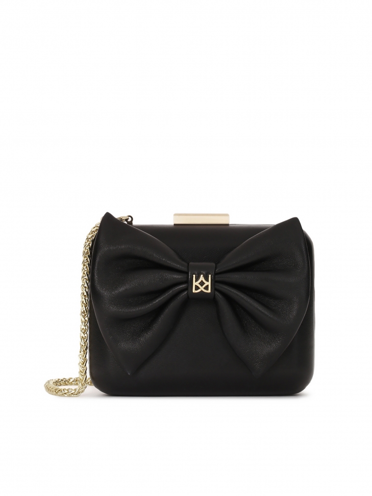 Black clutch bag with a large bow on the front