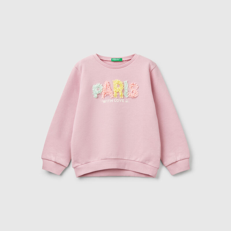 Sweatshirt with petal look applique