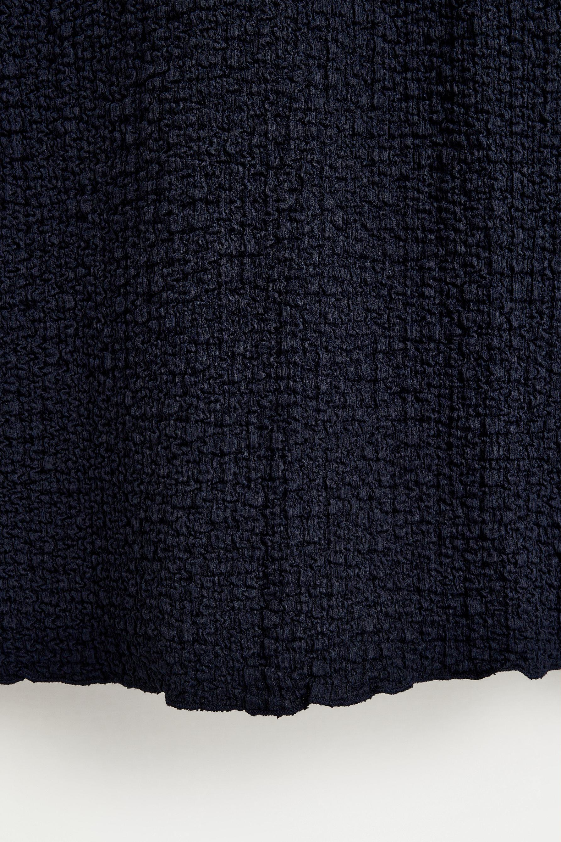 Falda midi textura