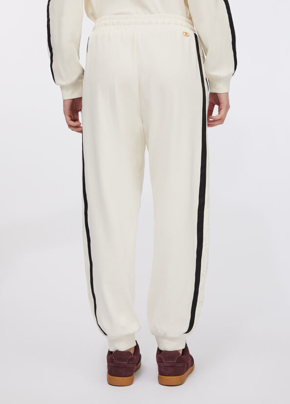 Pantaloni jogging in felpa con pizzo